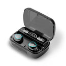 Real image: Open black wireless earbud power bank case with smoky lid & LED display showing "100%", "Be Loud", "Be Proud" battery levels. Two glossy black earbuds with blue accents are inside. "Be Strong" on lid.