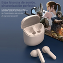 Two light beige Audífonos J220 Bluetooth earbuds, one with a red light, beside their open charging case on a blue surface. Blurred gaming graphic background with text 'Baja latencia de sonido.' Graphic design.