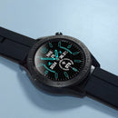 Close-up of a black smartwatch featuring a round screen with bright blue digital time (12), date (WED 25), temp (36.3°C), steps, and heart rate. Has a black silicone strap & bezel with 'SMART WATCH'. Real product shot on blue.