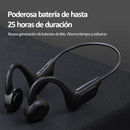 Black matte Audífonos de Conducción Aérea VG06 on dark surface. Sleek, open-ear design with visible controls. Text: "25 horas de duración" & "Nueva generación de baterías de litio." Real product image.