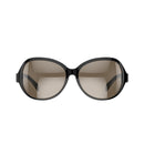 Oversized black butterfly sunglasses with glossy frames and brown tinted lenses, isolated on white. Sleek plastic design hints at integrated Bluetooth audio features. Graphic render.