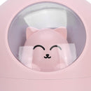 Pink cat-themed humidifier with a cute, smooth pink plastic cat face and simple black facial features, visible through a clear round dome. Real product photo.
