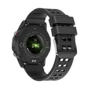 Rear view of a black SmartWatch NX9 with a textured silicone strap. Features a glowing green optical heart rate sensor, and visible text: "WATER RESISTANT," "HEART RATE SENSOR," "PEDOMETER," "CE," "FC." Real image.