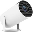 White cylindrical Mini Proyector HY300 on a minimalist white stand, featuring a black ribbed front panel with a prominent lens. This smooth, modern design is angled upwards against a clean white background.