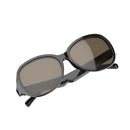 Gafas Sol Bluetooth F07: Glossy black sunglasses with oval dark brown lenses and thick frames, suggesting integrated audio. Rendered on a clean white background.