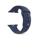 Navy blue, smooth silicone Apple Watch band, classic sport design with a metal pin closure & adjustment holes. Two curved pieces on a white background. High-quality product render.