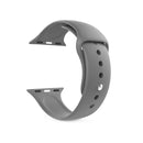 Smooth grey silicone Apple Watch band, curved, featuring pin-and-tuck closure holes and connectors. Presented on a white background. Graphic design.