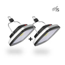 Graphic design of two black and silver rectangular LED solar lamps with red buttons & metal hanging hooks. Each lamp shows a yellow LED chip. "As" logo & "+" symbol visible on white background.