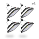 Four AS compact LED solar lamps: black plastic bodies, silver trim, white light panels, metal hanging hooks, & red buttons. Studio product photo.