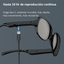 Sleek, glossy black Gafas Sol Bluetooth F07 sunglasses charging via USB-C cable with blue spark. Text: 'Hasta 10 Hr de reproducción continua' & 'Carga tipo C'. Graphic render.
