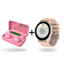 Pink wireless earbuds in an open charging power bank case showing '100%' charge, plus a beige smartwatch with a round black bezel displaying '03:08' and activity icons. Graphic.