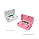 White and pink F9 TWS wireless earbuds in their open charging cases/powerbanks, both showing "100%" digital battery display. Smooth plastic, modern design. Graphic on white background.