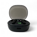 Audífonos PRO 50: Black wireless earbuds in an open matte charging case with a translucent dark lid. The case shows a green LED '78' battery display & a USB-C port. Earbuds have red indicator lights. Real product photo on a white background.