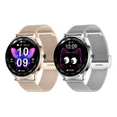 NX23 Pro smartwatches for women: rose gold with a purple butterfly face & silver with a pink cat face, both feature round digital screens on metallic mesh bands displaying time, calls & health metrics. Graphic design.