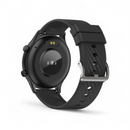 Matte black Smartwatch ZL73J, rear view. Round case with glossy heart rate sensor, two gold charging pins, and side buttons. Textured black silicone strap with silver buckle. Rendered on white.